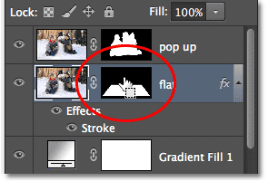 Clicking on the mask thumbnail for the 'flat' layer. Image © 2012 Photoshop Essentials.com.