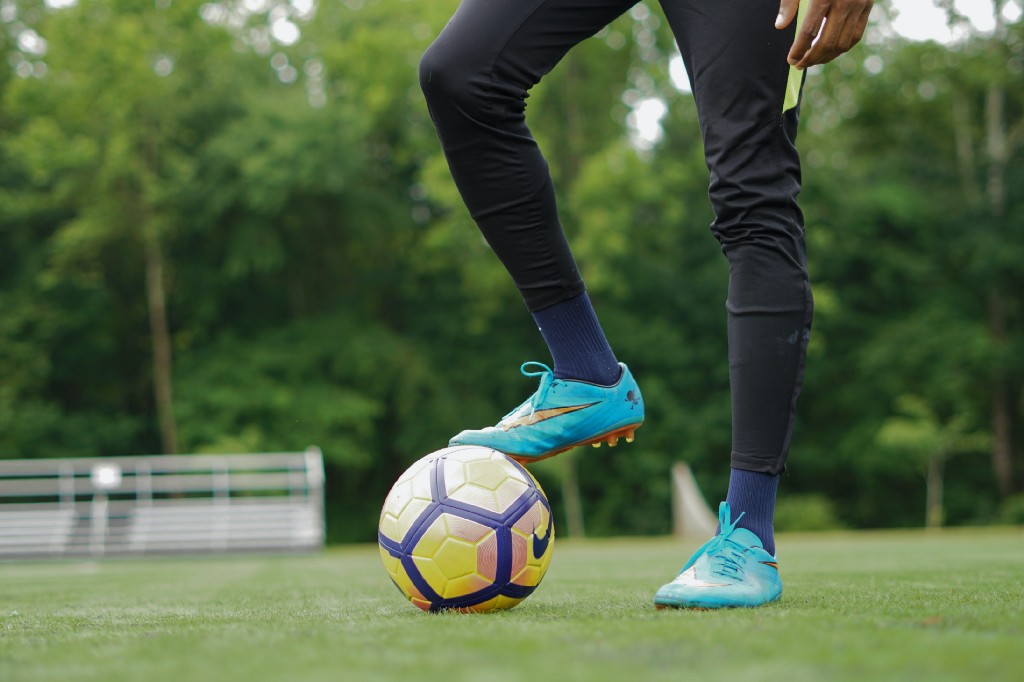 Soccer player about to kick off game