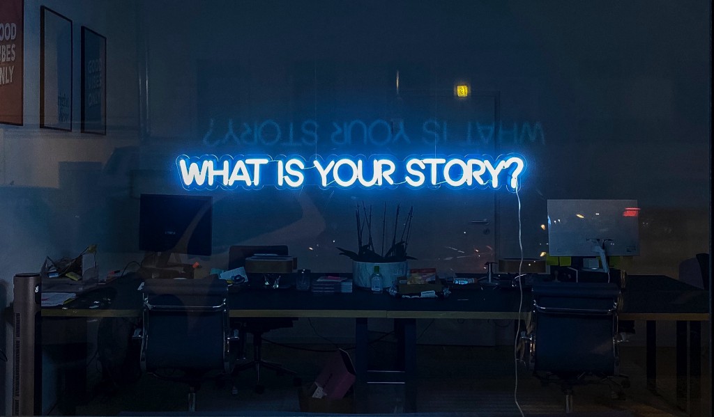 Widnow with ‘What is your story?’ in lights