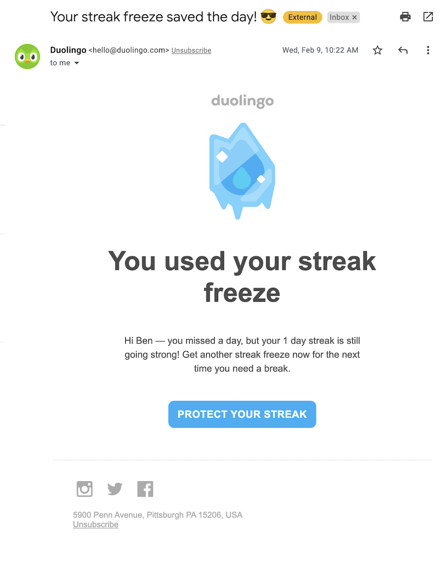 An email informing me I used a streak freeze to keep my daily learning streak intact with an illustration of a frozen flame.
