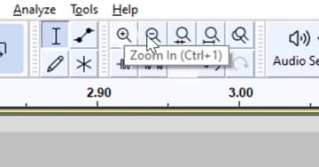 User clicking the zoom in and zoom out buttons for Audacity sound editing tutorial.