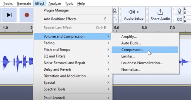 User clicking compressor menu item for Audacity audio editing tutorial.