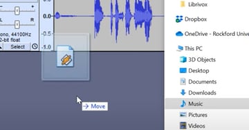 User importing audio by clicking and dragging for Audacity editing software overview.