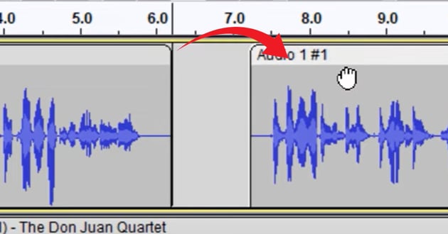 User splitting audio tracks for Audacity podcast editing.