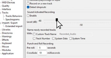 User adjusting the input volume and gain settings in Preferences Menu to demonstrate Audacity setup.