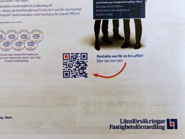 Advertisment with a QR-code and a text beside it saying "Contact us for a good deal or read more here".
