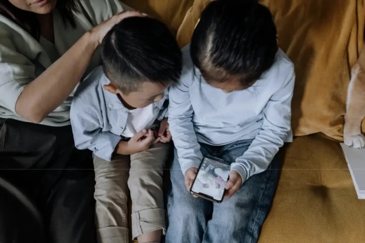 Kids playing with a smartphone