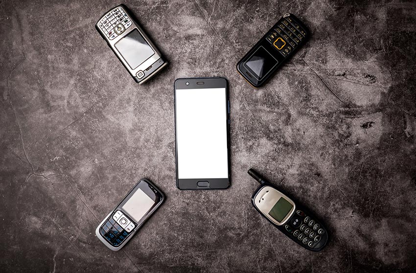 Many obsoleted cellphones and a smartphone