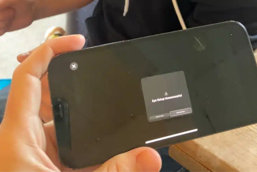 Phone screen saying "Eye setup unsuccessful" with two buttons "Skip eye setup" and "Retry eye setup". 