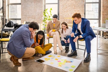 Group of people evaluating a strategy