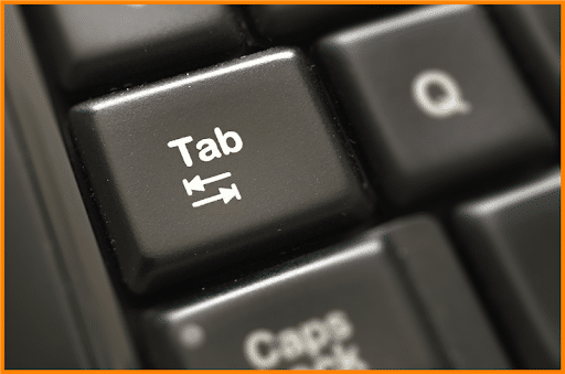 Tab key on a black keyboard.