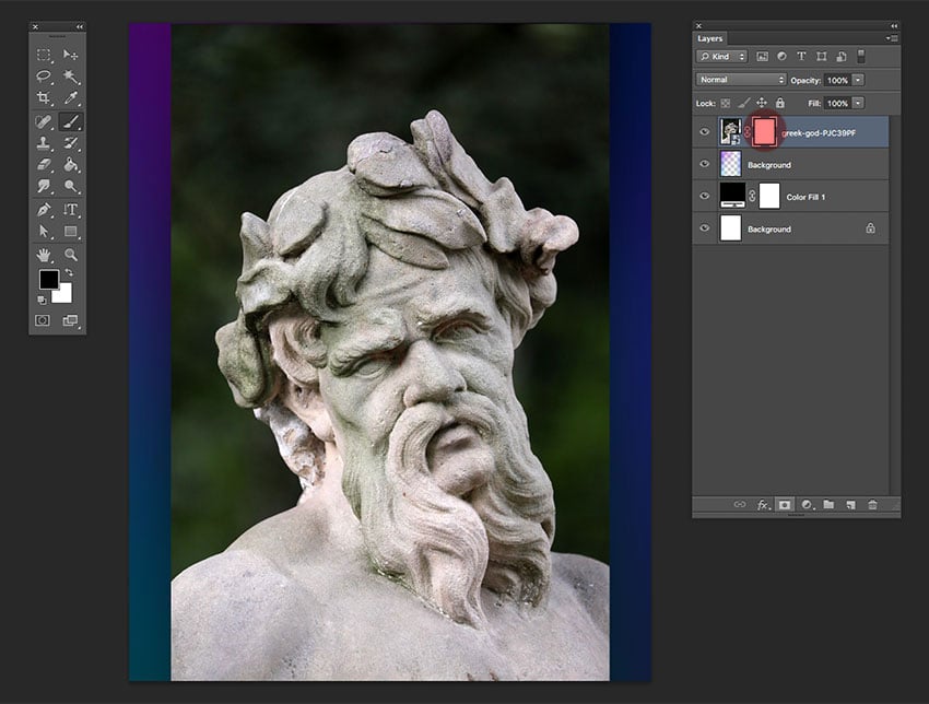 Add a layer  mask to the Greek God layer