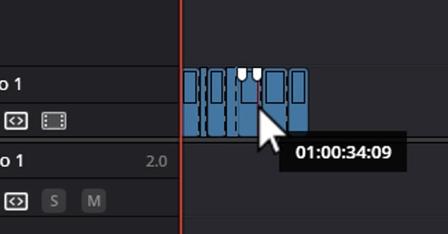 How to cut a clip in DaVinci Resolve: Using Blade Edit Mode on several spots.