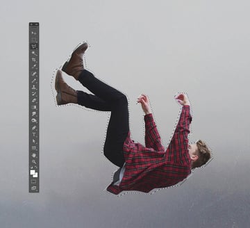 Use the silhouette of a man falling like in the poster of Vertigo by Hitchcock.