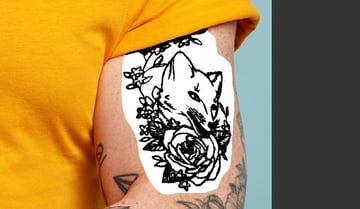 How to remove tattoos in Photoshop: darken the tattoo.