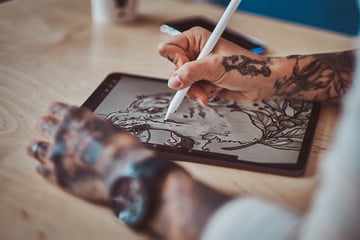 Closeup photo of drawing process in digital pad