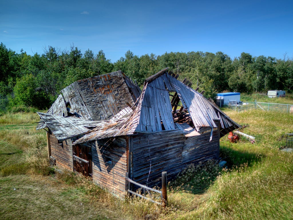 Image of a collapsing barn.